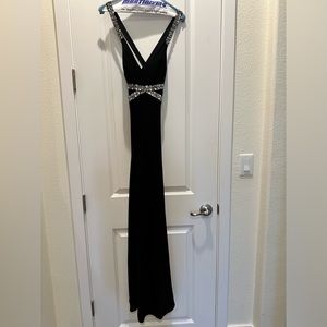 Morgan and Co., gown with cut out back to bottom draping, fits gorgeous,size xs